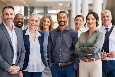 A business team standing together for a photo